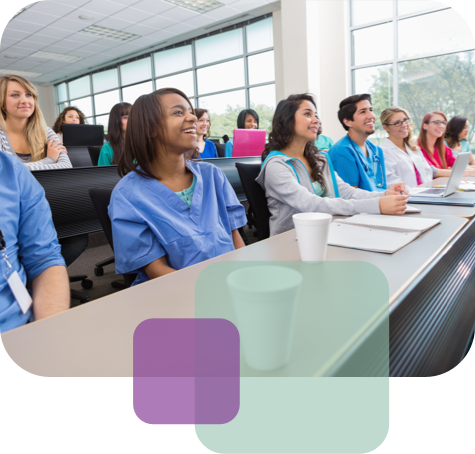 Healthcare students learning in a classroom setting with instructor guidance